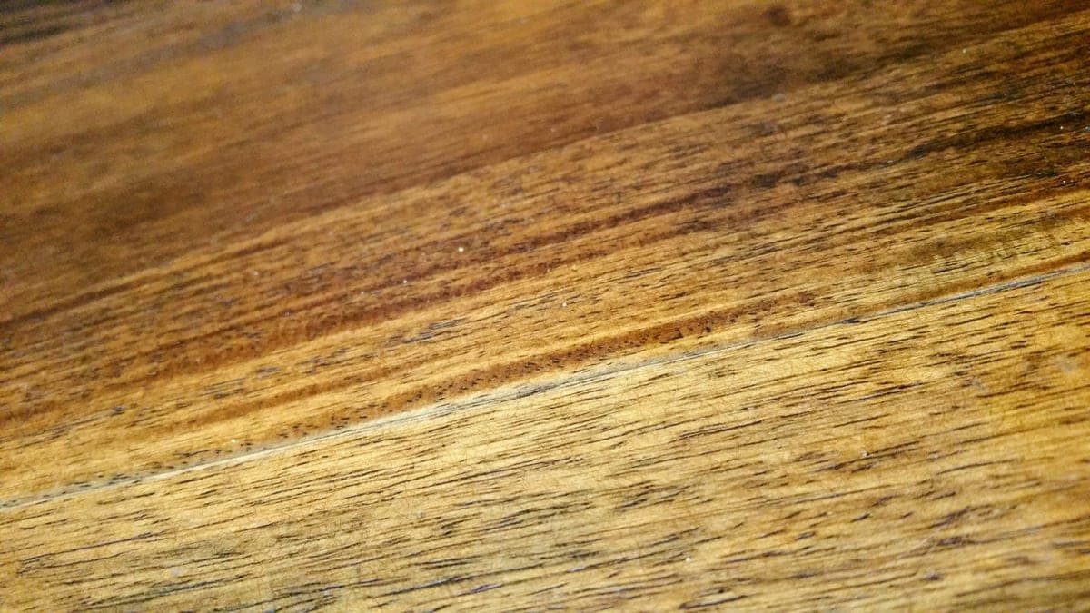 Close-up of a textured wooden floor surface